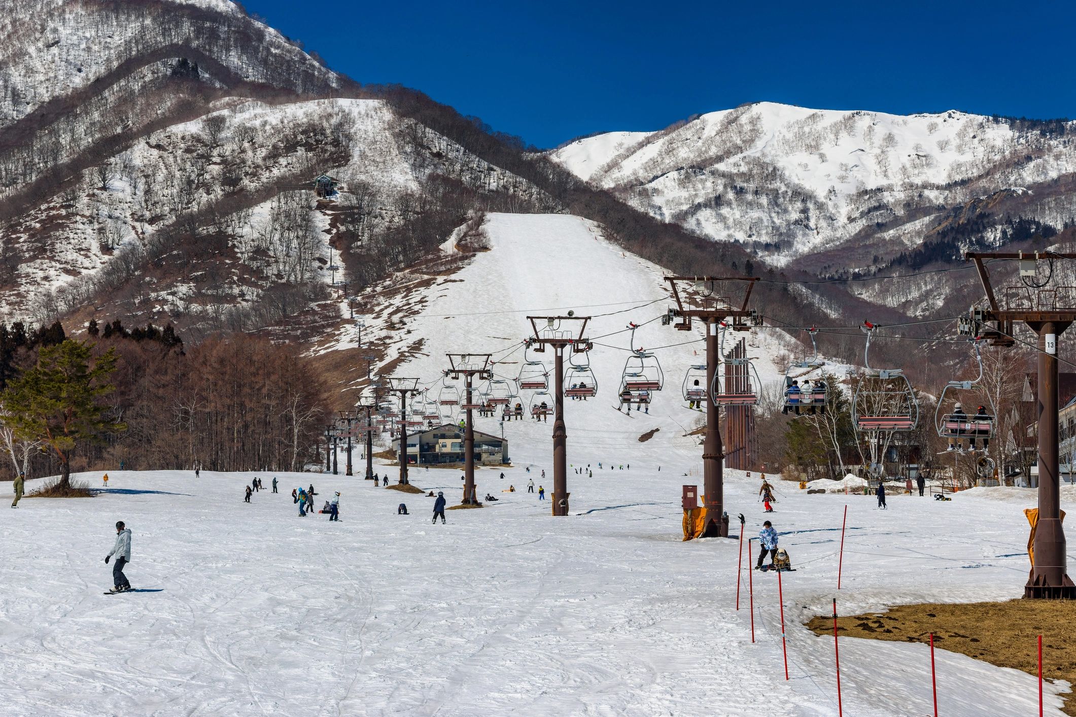 Skiers and snowboarders enjoying a snowy resort